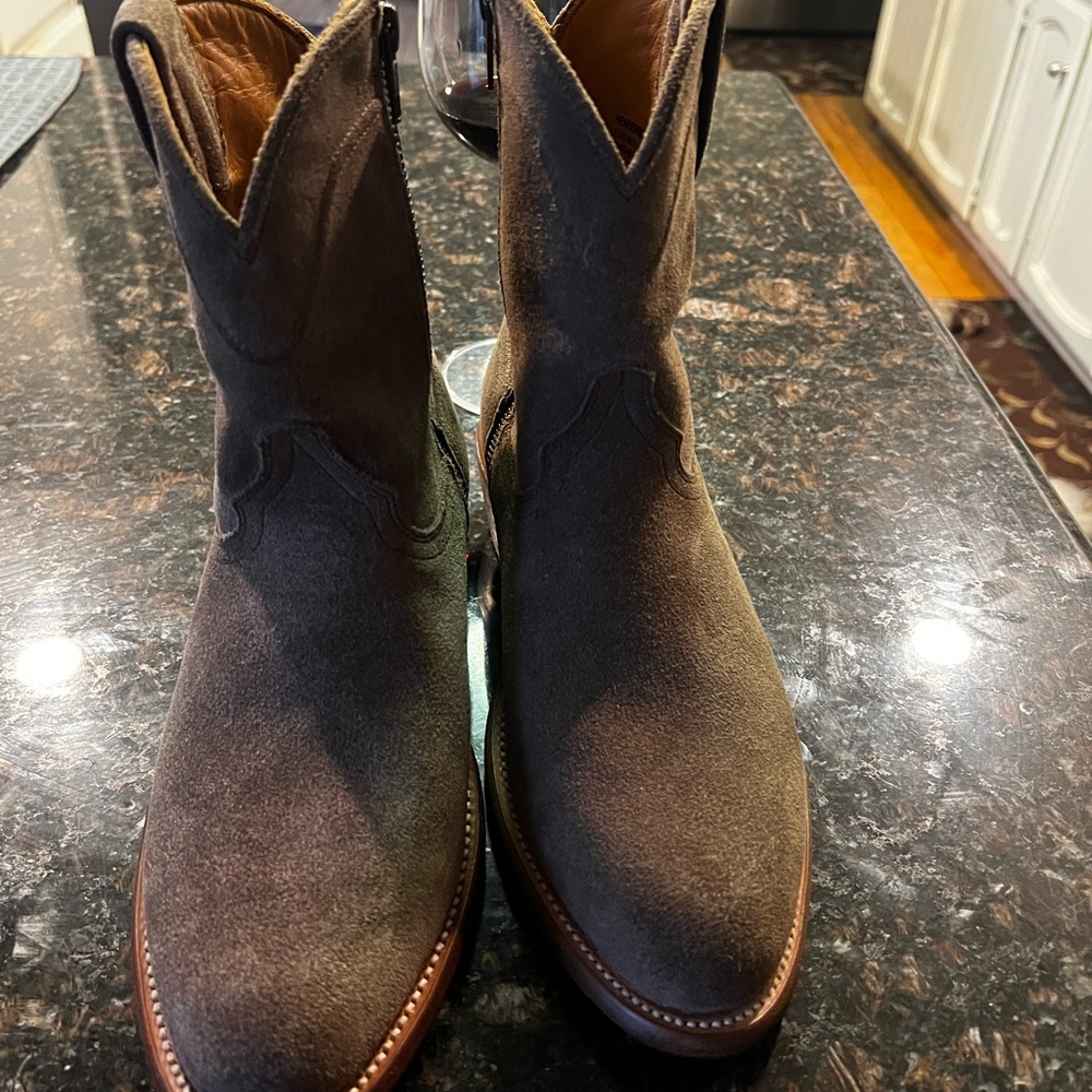 Never worn. Brand new. Suede boots.